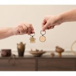 GASTON HOUSE. House-shaped iron keychain in zinc and bamboo